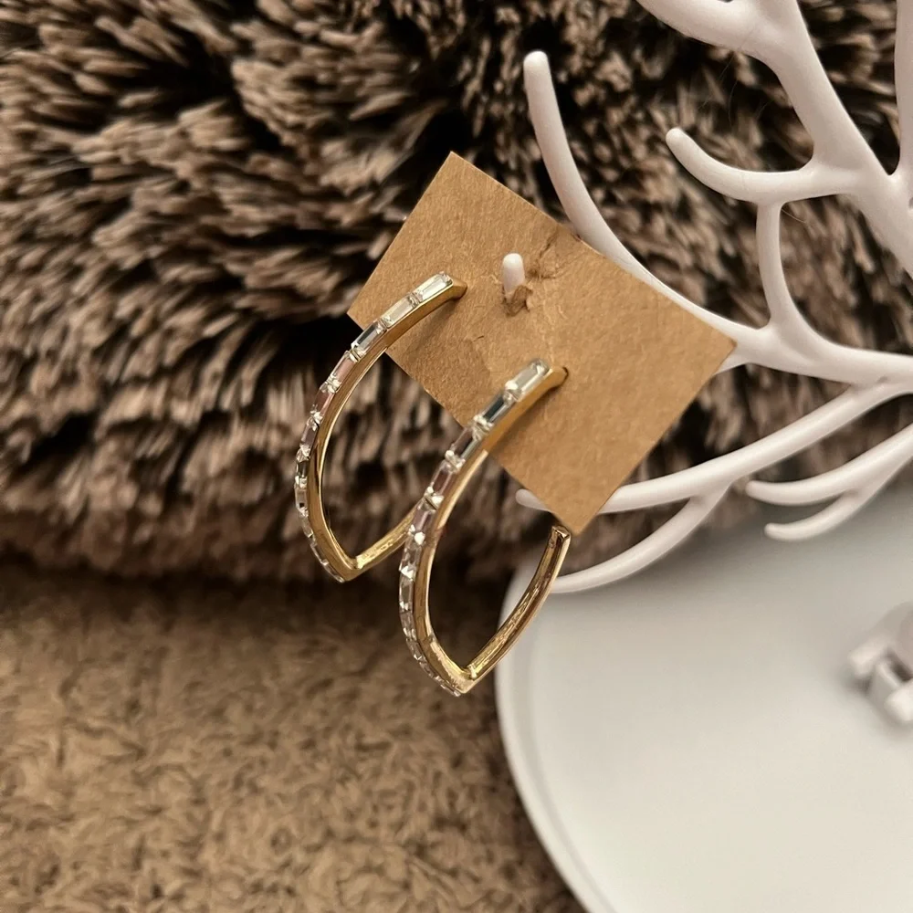 Crystal gold plated open tear drop earrings